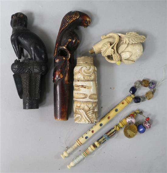 2 lace bobbins, carved umbrella handles and a Japanese perfume bottle